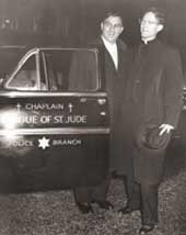 Entertainer Danny Thomas with Claretian Father Richard Farrell, who served as chaplain of the Police Branch of the St. Jude League.